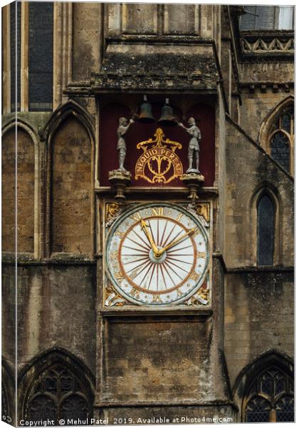 Clock on exterior wall of Wells Cathedral Canvas Print by Mehul Patel
