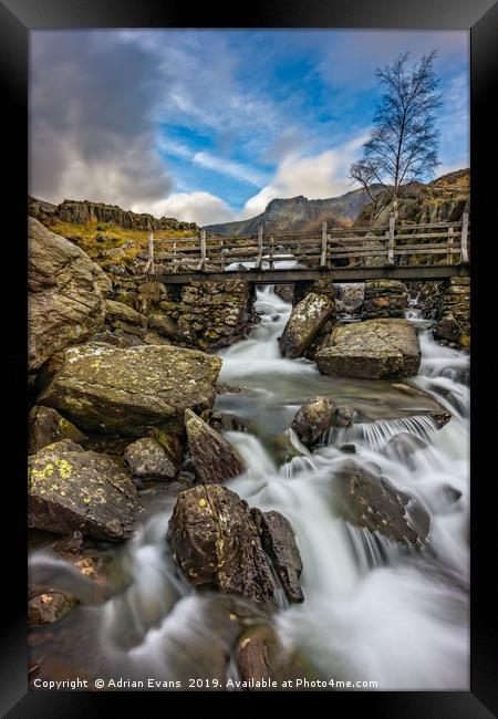River Footbridge Snowdonia Framed Print by Adrian Evans