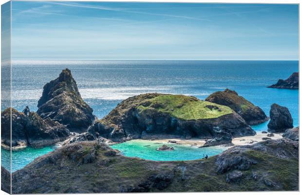 Lone photographer on the rocks at Kynance Cove Canvas Print by Andrew Michael