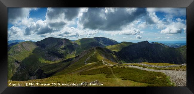 Panoramic view from the top of Grisedale Pike Framed Print by Phill Thornton