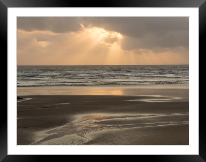 Ray of sunlight through the clouds at Westward Ho! Framed Mounted Print by Tony Twyman