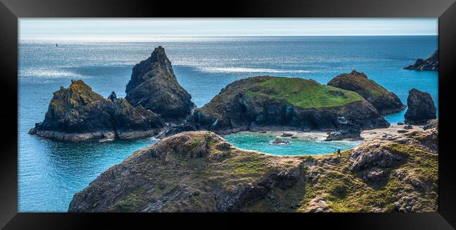 Lone photographer on the rocks at Kynance Cove 2 Framed Print by Andrew Michael