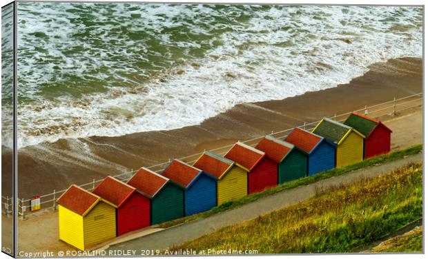 "Colourful new beach huts at Whitby" Canvas Print by ROS RIDLEY