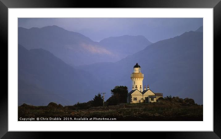 Winter light on Isle Ornsay Lighthouse  Framed Mounted Print by Chris Drabble
