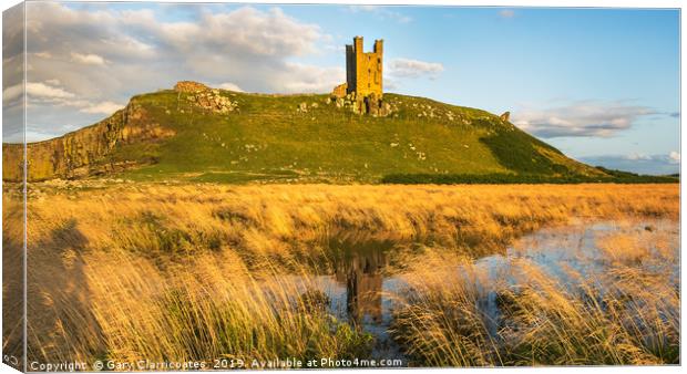 Dunstanburgh Reflection Canvas Print by Gary Clarricoates