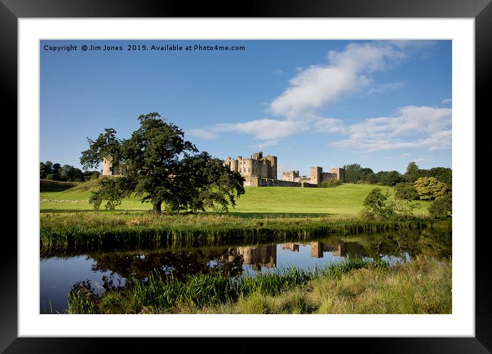 Alnwick Castle reflected in the River Aln Framed Mounted Print by Jim Jones