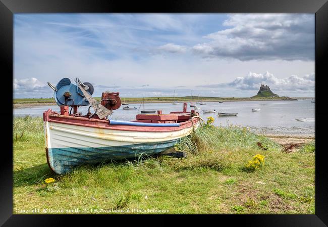 Boat Overlooking Holy Island Harbour Framed Print by David Smith