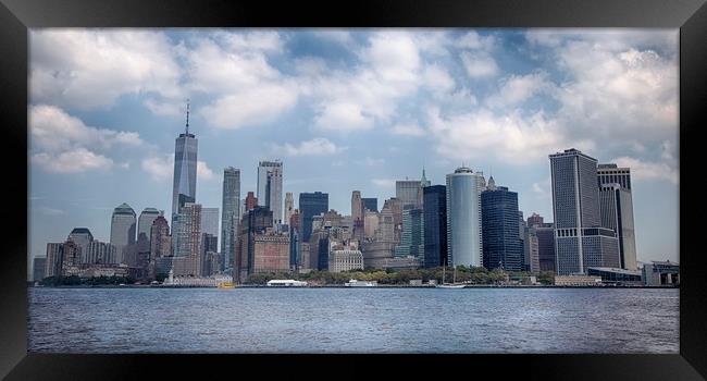 Manhattan Skyline Framed Print by Phil Clements