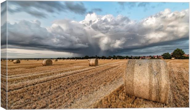 A cloudburst over Titchwell and Brancaster Canvas Print by Gary Pearson