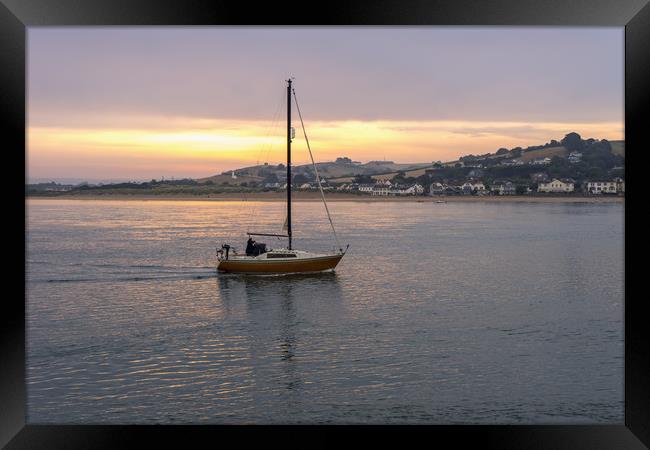 Yacht sailing towards Instow in Devon at Sunrise Framed Print by Tony Twyman