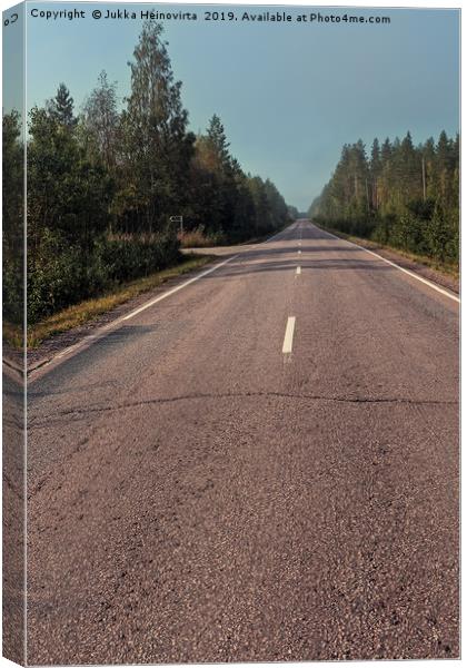 Empty Road On A Misty Morning Canvas Print by Jukka Heinovirta