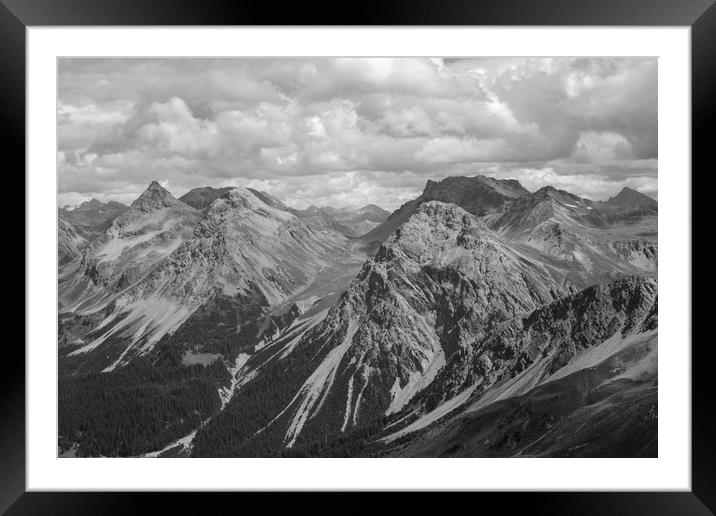 Swiss mountains on a cloudy day Framed Mounted Print by Rob Evans