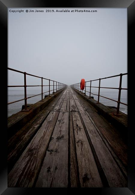 Wooden pier disappearing into the fog Framed Print by Jim Jones