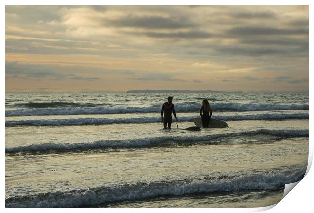 Sunset surfers at Westward Ho! in Devon Print by Tony Twyman