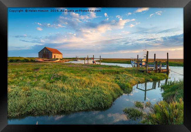 The picturesque old harbour at Thornham in Norfolk Framed Print by Helen Hotson