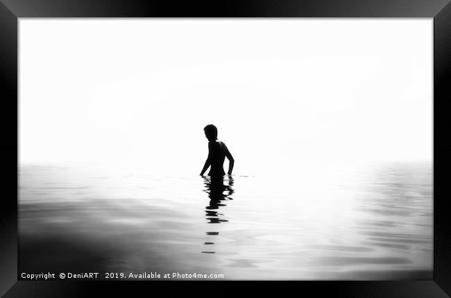 Boy in the sea black and white version Framed Print by DeniART 