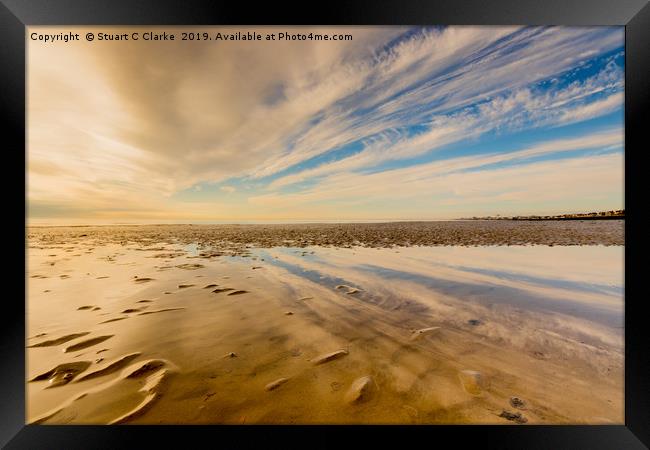 Low tide beach reflections Framed Print by Stuart C Clarke