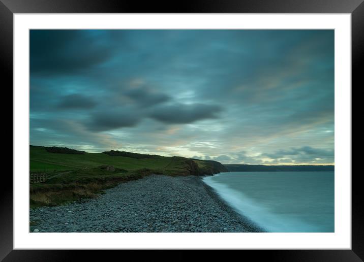 Moody sky at High tide on South West coast path  Framed Mounted Print by Tony Twyman