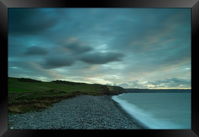 Moody sky at High tide on South West coast path  Framed Print by Tony Twyman