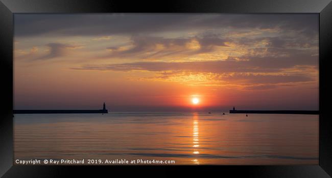 Sunrise Between the Piers Framed Print by Ray Pritchard