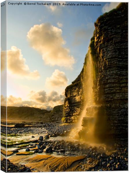 Sunset Waterfall, cliff, Nash Point, Wales, UK Canvas Print by Bernd Tschakert