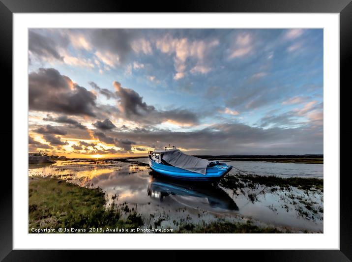 Stormy skies at sunset at Penclawdd Framed Mounted Print by Jo Evans