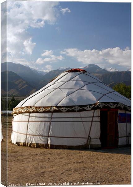 Yurt in front of a mountain range in Kyrgyzstan Canvas Print by Lensw0rld 
