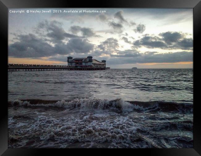 Sunset over the Grand Pier Framed Print by Hayley Jewell