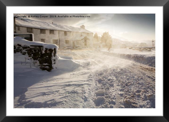 The Kirkstone Pass Inn, plastered in fresh snow  Framed Mounted Print by Ashley Cooper