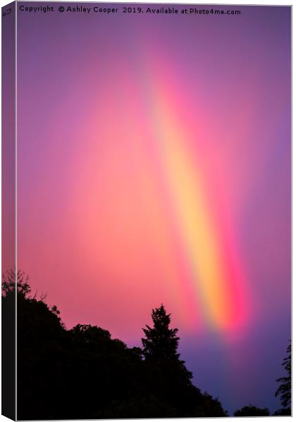 Rainbow at sunset Canvas Print by Ashley Cooper