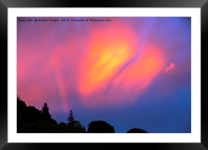A dramatic rainbow at sunset over Ambleside Framed Mounted Print by Ashley Cooper