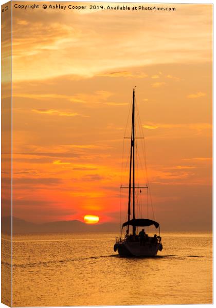 Sailing into sunset. Canvas Print by Ashley Cooper