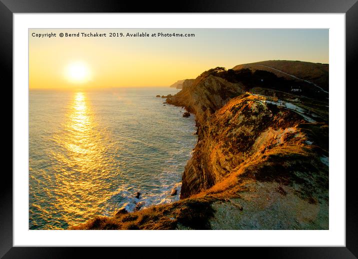 Sunset at Lulworth coast, Dorset, England, UK Framed Mounted Print by Bernd Tschakert