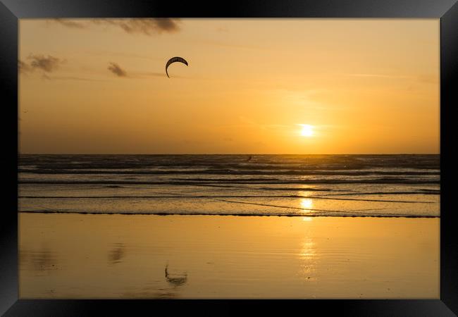 Sunset kite surfer at Westward Ho! in Devon Framed Print by Tony Twyman