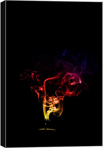 Incense smoke trail in colour Canvas Print by Pam Martin