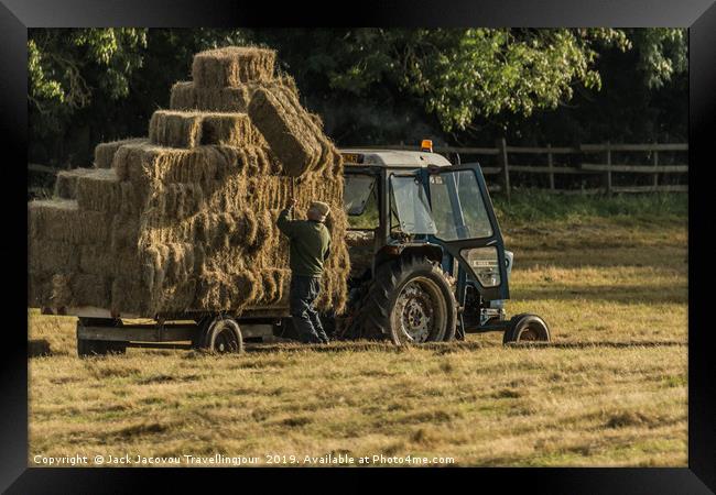 Farmer hay stacking Framed Print by Jack Jacovou Travellingjour