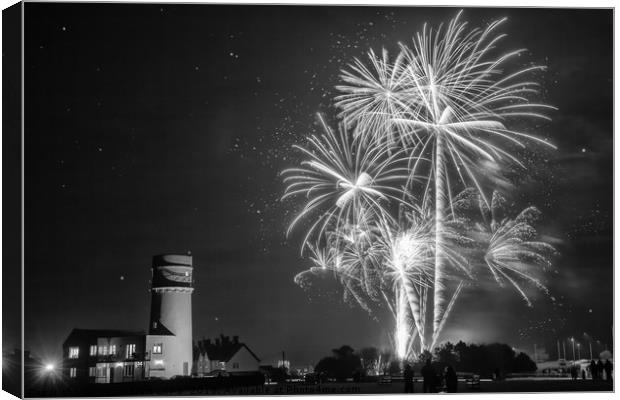 Amazing fireworks at night over lighthouse Canvas Print by Simon Bratt LRPS