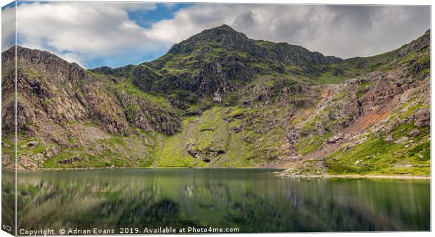 Lake Glaslyn with Mount Snowdon Canvas Print by Adrian Evans