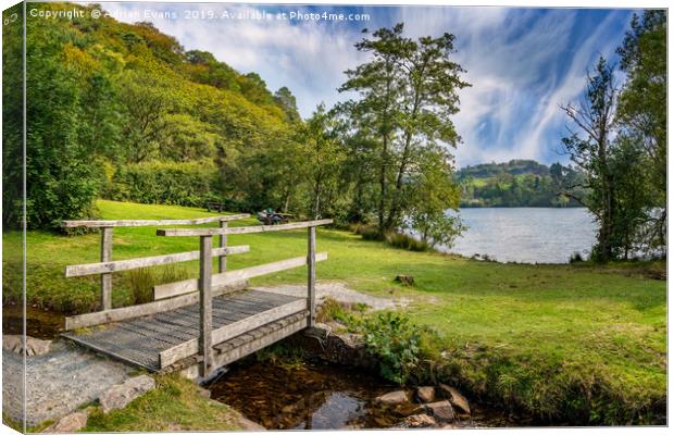 Wooden Bridge to Mair Lake Canvas Print by Adrian Evans