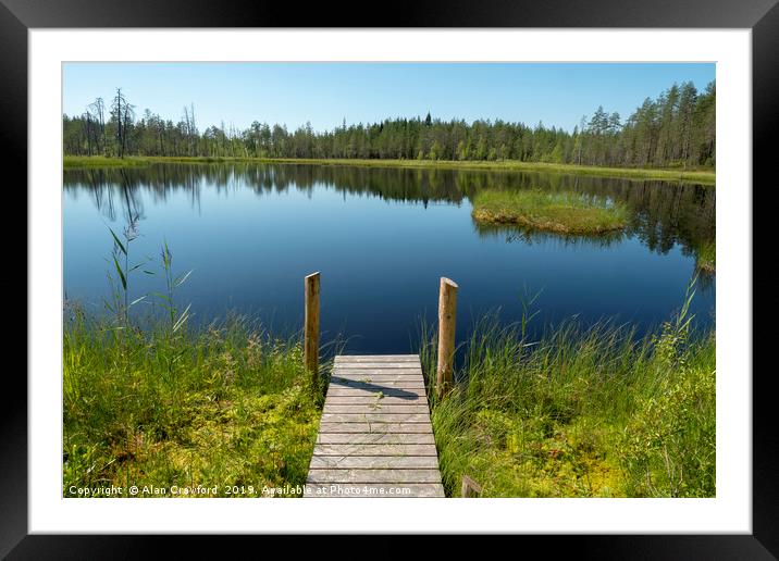 Jetty by a lake in Finland Framed Mounted Print by Alan Crawford