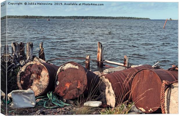 Debris By The Remains Of An Old Pier Canvas Print by Jukka Heinovirta