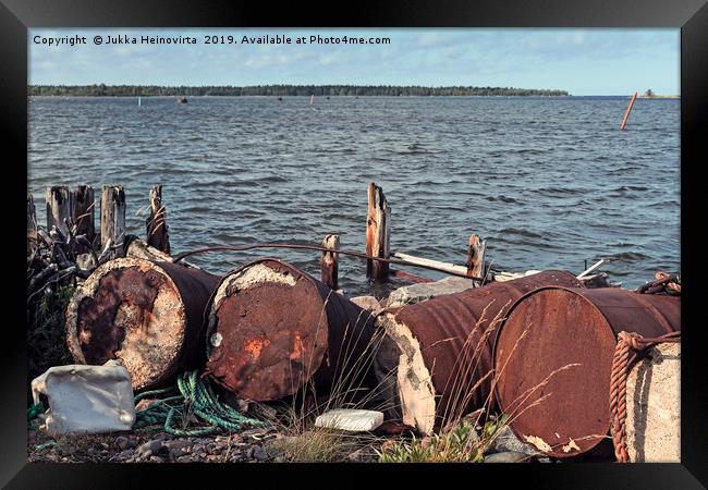 Debris By The Remains Of An Old Pier Framed Print by Jukka Heinovirta