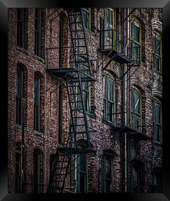 Wrought Iron Fire Escapes in Brick Alley Framed Print by Darryl Brooks