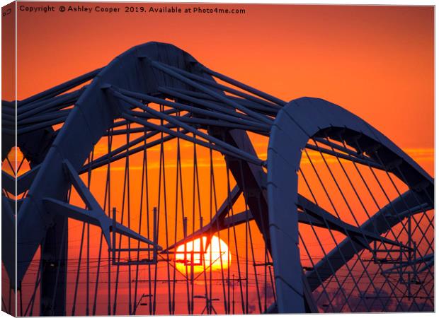 Sunset bridge. Canvas Print by Ashley Cooper