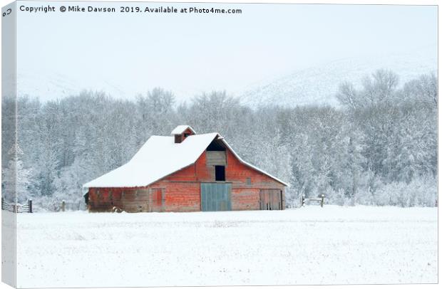 Winter Red Barn Canvas Print by Mike Dawson