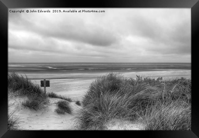 The Lonely Shore Framed Print by John Edwards