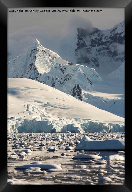 Antarctic spire. Framed Print by Ashley Cooper