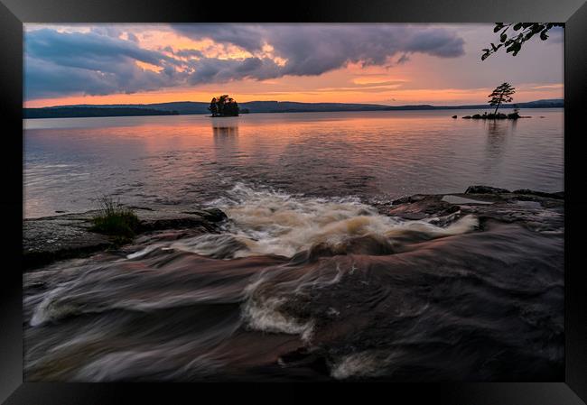 streaming water sunset over lake Framed Print by Jonas Rönnbro