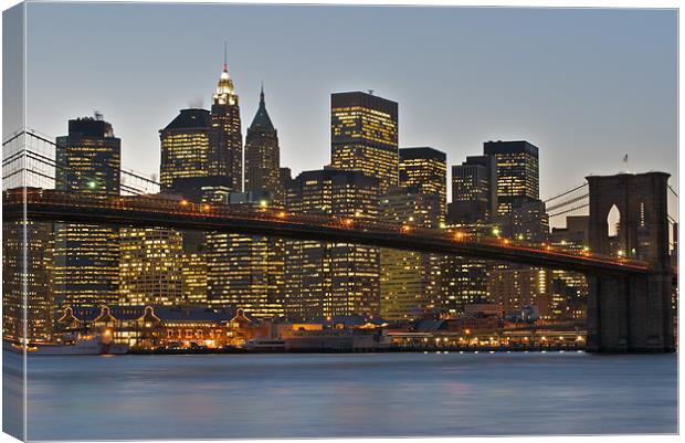 Manhattan at sunset Canvas Print by Thomas Stroehle