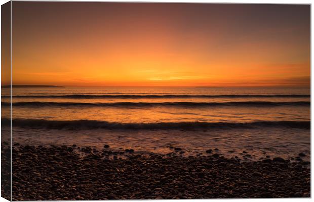 Westward Ho sunset waves Canvas Print by Tony Twyman